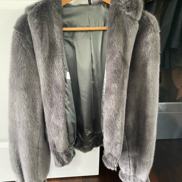 grey hooded fur jacket